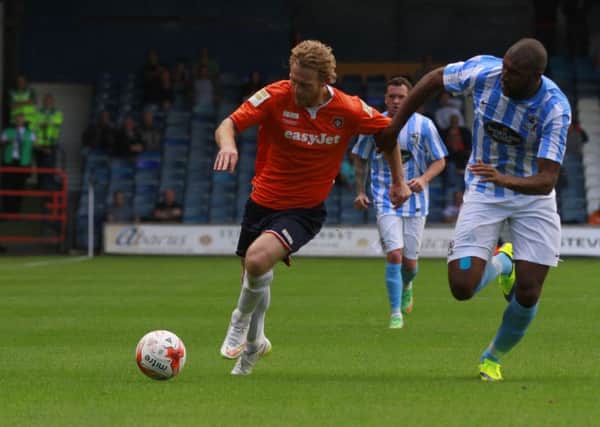 Craig MacKail-Smith under pressure during the Friendly match between Luton Town and Coventry City. Photo by Liam Smith.