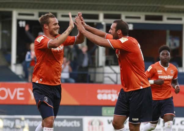 Luke Wiliinson of Luton Town (left) celebrates with Mustapha Tiryaki after scoring the opening goal during the Friendly match between Luton Town and Brentford at Kenilworth Road, Luton, England on 28 July 2015. Photo by Liam Smith. PNL-150729-065608002