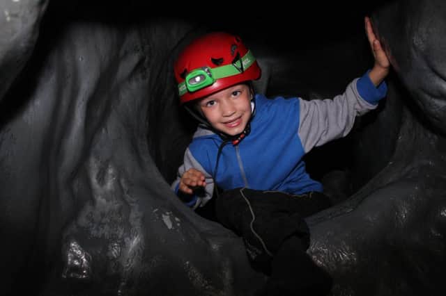 Hayden Hughes, seven, of Luton, enjoying the cave experience