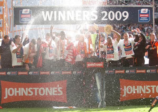 Luton Town celebrate their Johnstone's Paint Trophy win in 2009