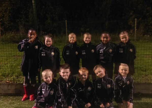 Dunstable Colts under 8's are taking on the challenge to raise money for a winter training pitch