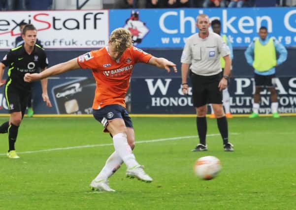 Cameron McGeehan scores from the spot