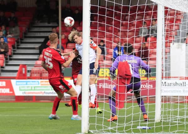 Cameron McGeehan heads Hatters in front at Crawley