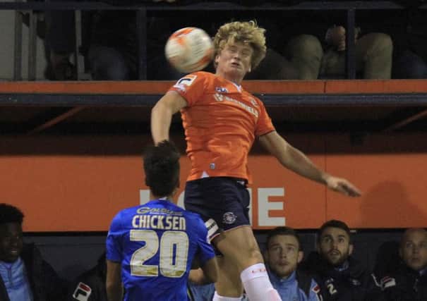 Cameron McGeehan heads on against Orient