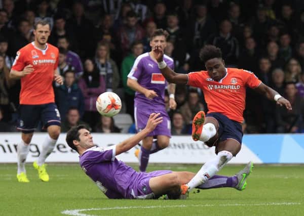 Pelly Ruddock Mpanzu in action on his 50th appearance for Luton