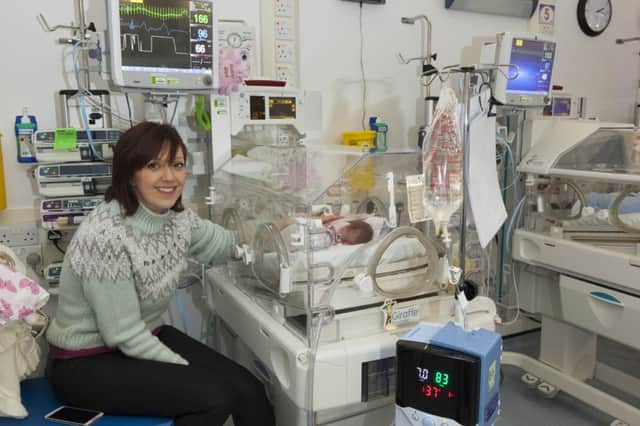 Jeni Read with her daughter Phoebe in the NICU