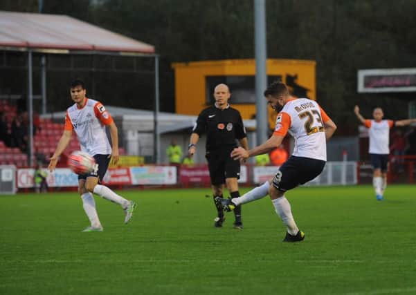 Josh McQuoid scores his first against Crawley