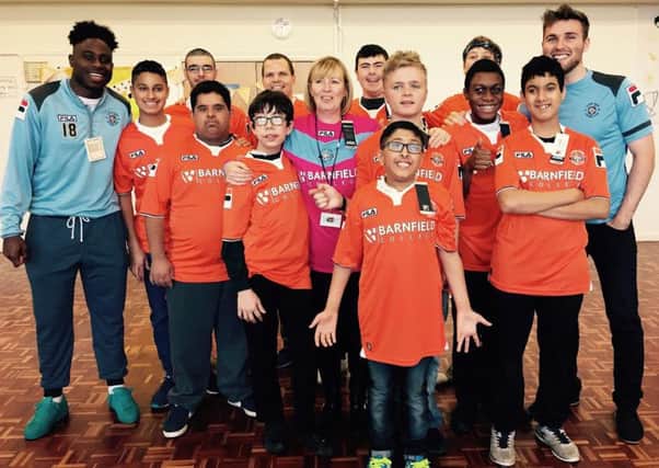 Luton Town players visit Woodlands School.