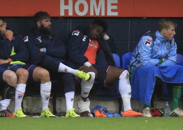 Pelly Ruddock Mpanzu after being forced off against Plymouth