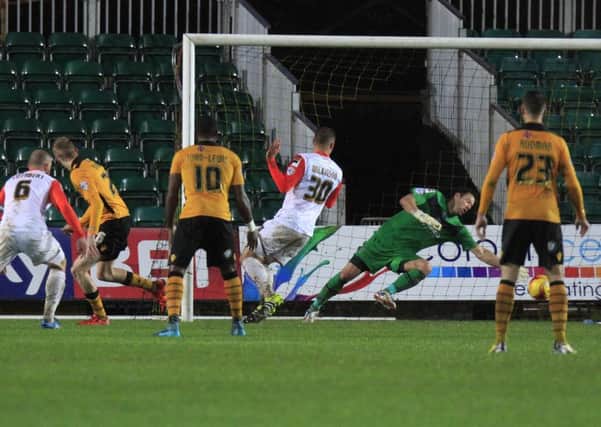 Mark Tyler can't prevent Oliver McBurnie opening the scoring for Newport