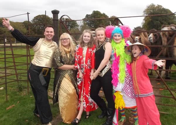 Members of the Phoenix Players at Woburn Safari Park, where they launched the pantomime
