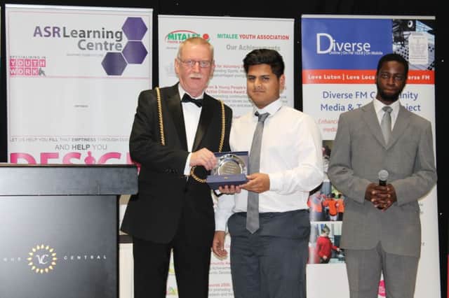 Luton Mayor Cllr  Dave Taylor presenting one of the awards at Diverse FM's annual ceremony
