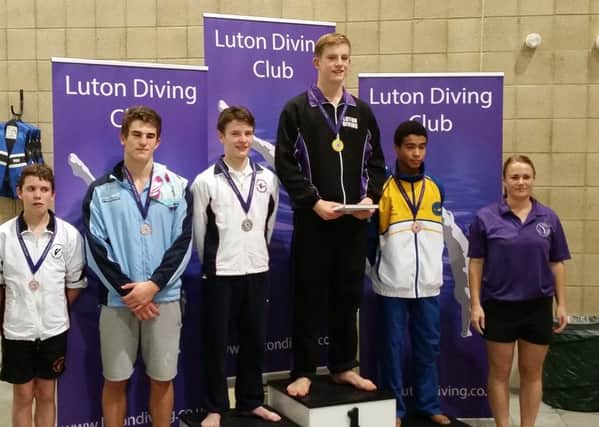 Henry Biggs celebrates his gold medal at the Luton Challenge