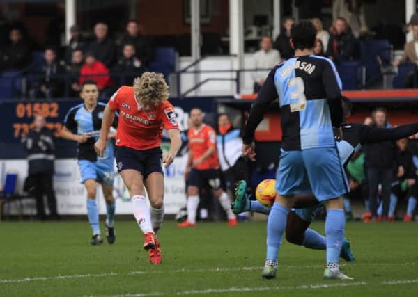 Cameron McGeehan shoots for goal against Wycombe