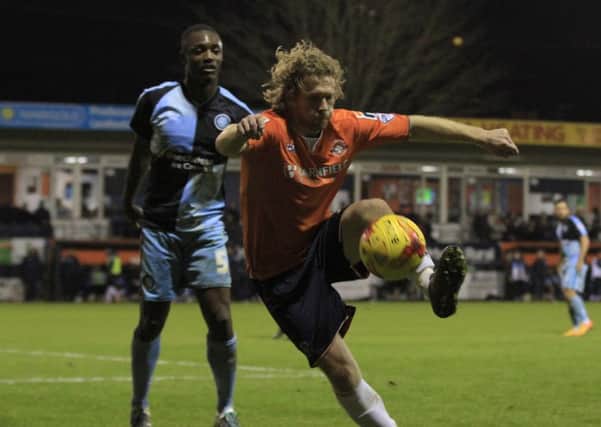 Craig Mackail-Smith in action against Wycombe
