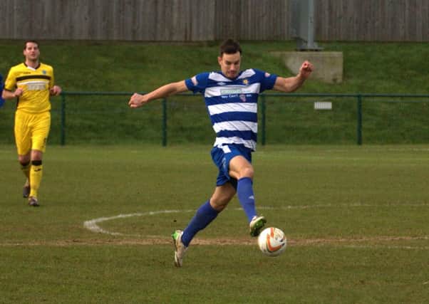 Dunstable Town's Steven Gregory in action against Dorchester on Saturday