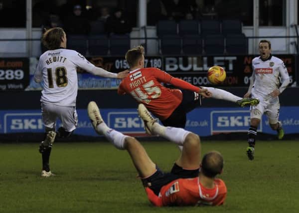 New signing Joe Pigott saw this late shot cleared off the line