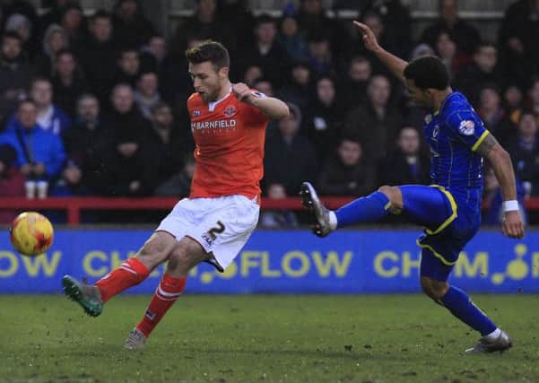 Stephen O'Donnell clears downfield against AFC Wimbledon