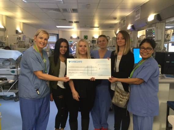 Destini, Linda and Paula presented the cheque to the nurses at the Neonatal Unit at the Luton and Dunstable hospital