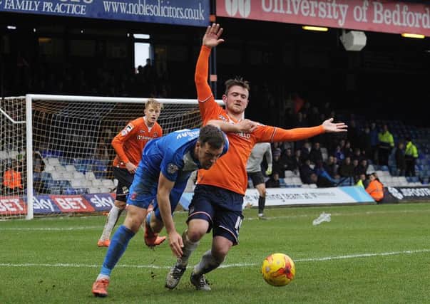 Jack Marriott makes a challenge in Hatters' victory over Hartlepool