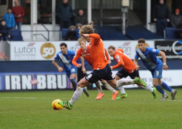 Cameron McGeehan scores from the penalty spot against Hartlepool