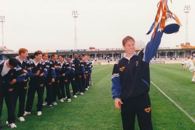 Matthew Upson celebrates a cup triumph in 1996-97