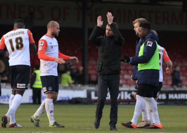 Nathan Jones applauds the 715 travelling Hatters fans at York