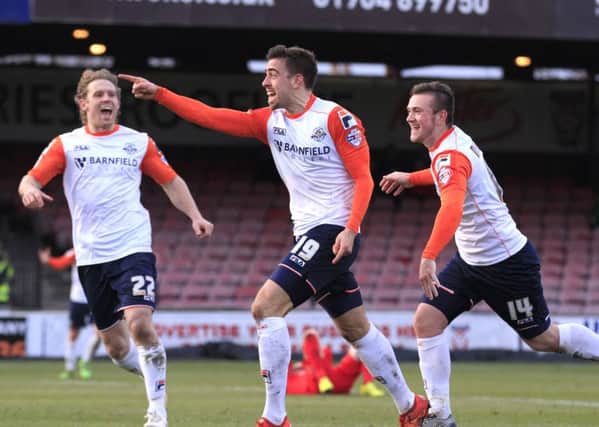 Olly Lee celebrates his dramatic late winner on Saturday