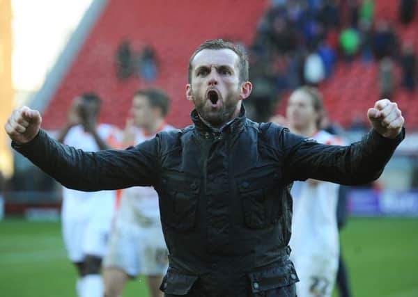 What a feeling: Nathan Jones celebrates Luton's 1-0 win at Leyton Orient