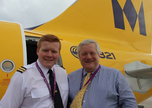 A proud moment for Mark Deacon when he accompanied pilot  son Adam on his first commercial flight