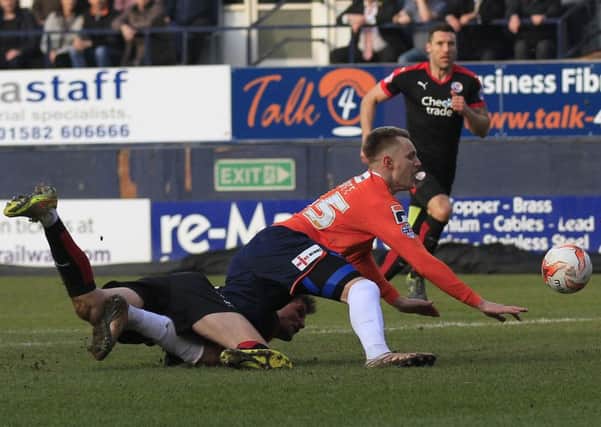 Joe Pigott tumbles in the box but no penalty was given on Saturday