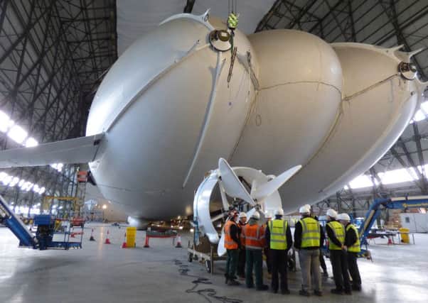 An engine is attached to the rear of the Airlander PNL-160315-095608001