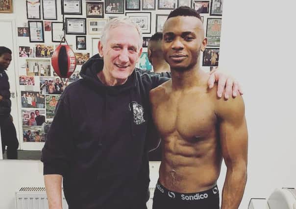 Linus Udofia with trainer Terry Stewart