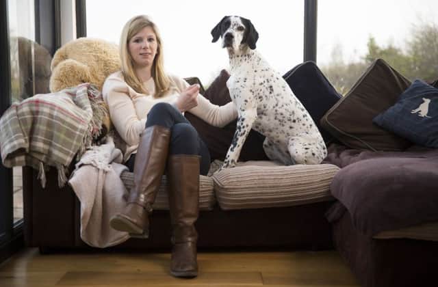 Hollie Wilson and her dog Olive, who survived babesiosis
