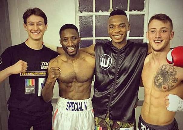 Luton boxer Linus Udofia celebrates his first professional victory