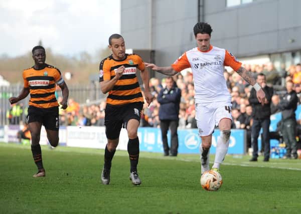 Alan Sheehan races down the wing for Luton at Barnet