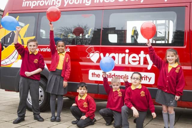 Six pupils from Chantry attended the Variety Sunshine Coach presentation with assistant headteacher, Jamie Kelly, they met with employees from Leeds Building Society and Variety representatives. Photo by Variety
