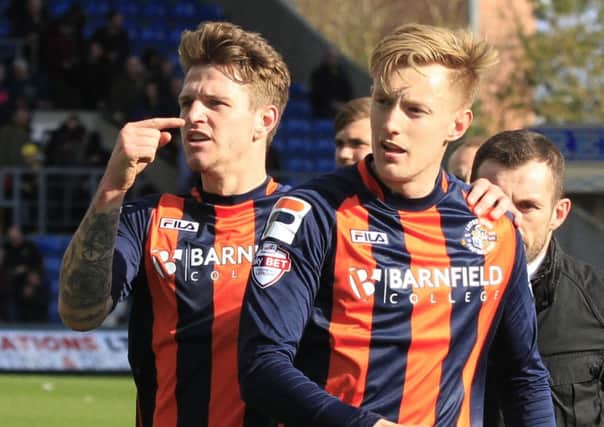 Joe Pigott takes the acclaim after his double against Oxford