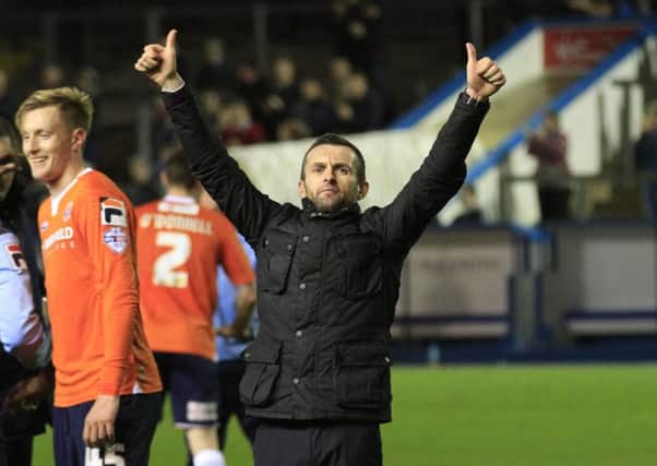 Town boss Nathan Jones celebrates his side's 2-1 win at Carlisle