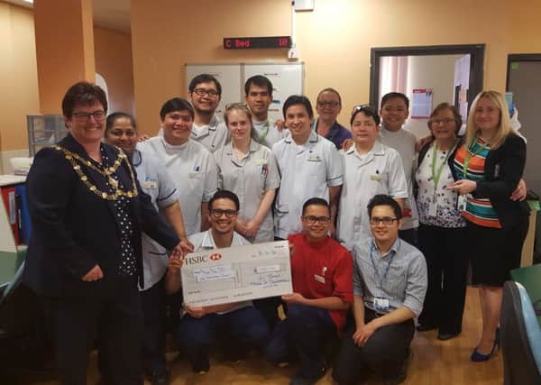 Mayor of Dunstable presents a cheque for Â£1000 to the Renal Unit at the Luton and Dunstable University Hospital