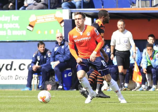 Hatters midfielder Olly Lee has agreed a contract extension