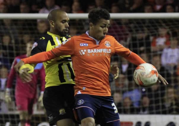 Zane Banton has agreed a new one year deal with Luton