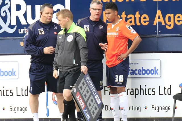 James Justin gets some final instructions before his Luton debut