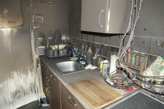 What can happen in a kitchen fire: Stock image