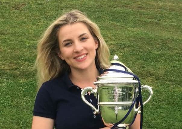 Annabel Pitts with the Beds Ladies Championship Trophy PNL-161105-140528002