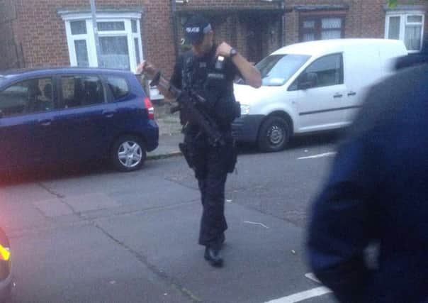 Armed officers were called to the scene