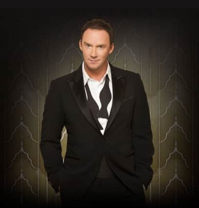 Russell Watson has topped the charts in the UK and USA
