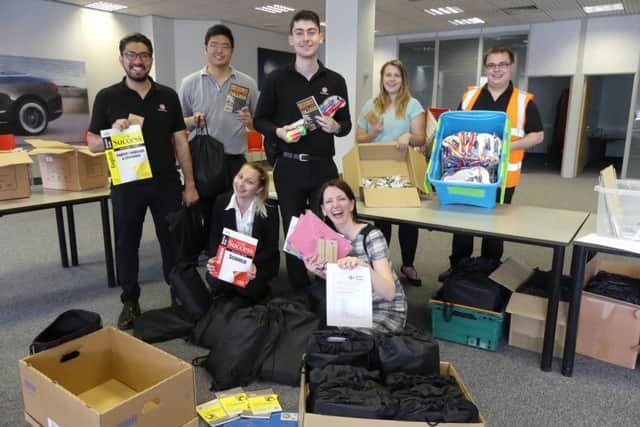 Volunteers from Vauxhall helped pack the stationary bags with Level Trust