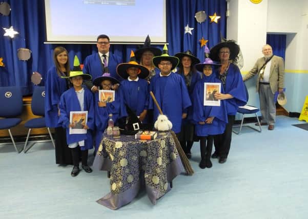 Beech Hill pupils and staff look the part for Harry Potter reading to break Guinness world record