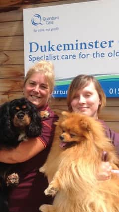 Sainsburys colleagues Elaine Wilson and Sarah Goreham visit Dukeminster Care Home with Elaine's dogs.